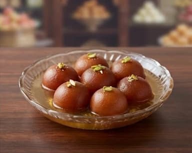 Découvrir la recette Beignets indiens au sirop